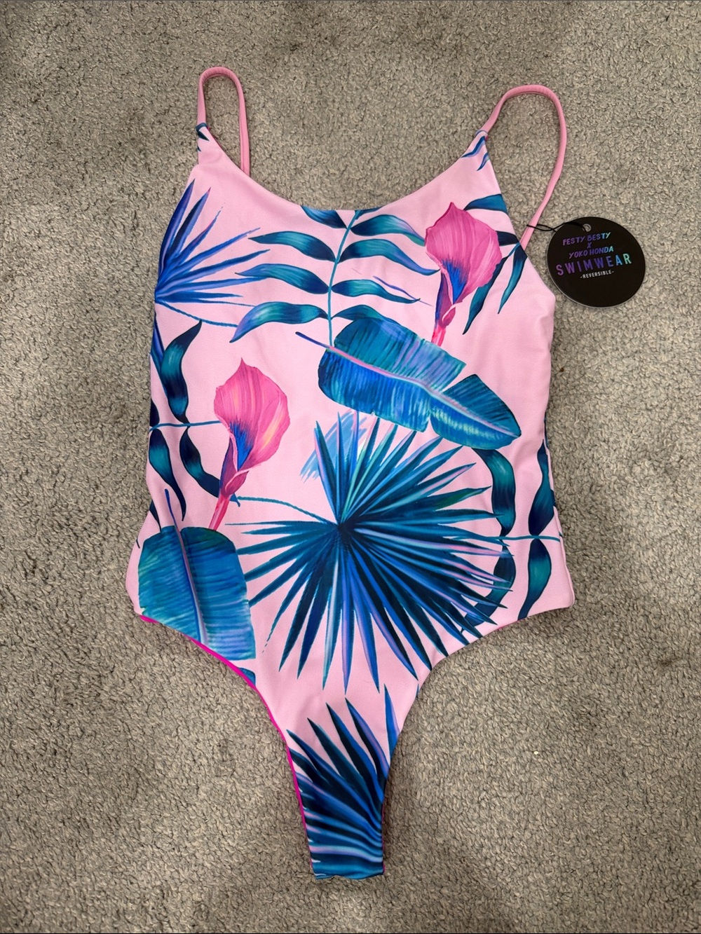 Roxy Pink One-Piece Swimsuit with Blue Tropical Leaf Design